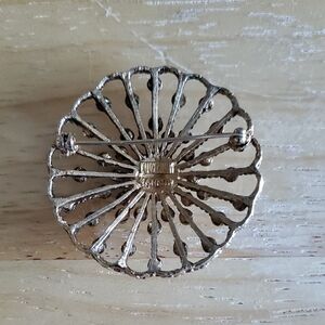 Elegant Silver Floral Brooch
